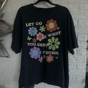 Black Graphic T-Shirt with Colorful Floral Design